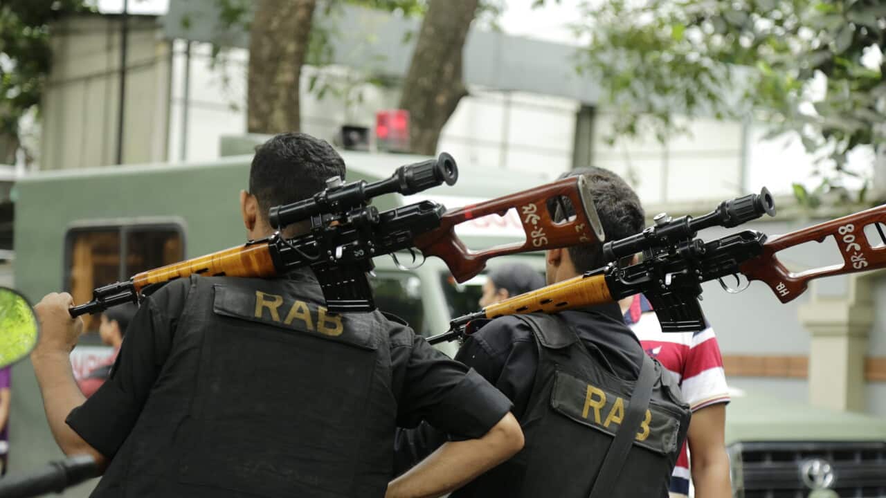 Members of the Rapid Action Batallion (RAB) in the the streets close to the Holey Artisan Bakery in Dhaka, Bangladesh