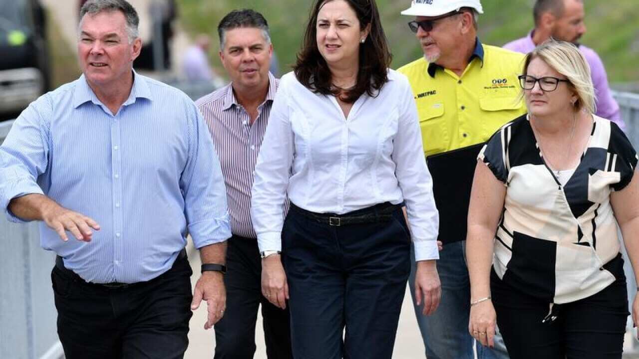 Scott Stewart (l), Aaron Harper (2nd l), Annastacia Palaszczuk.
