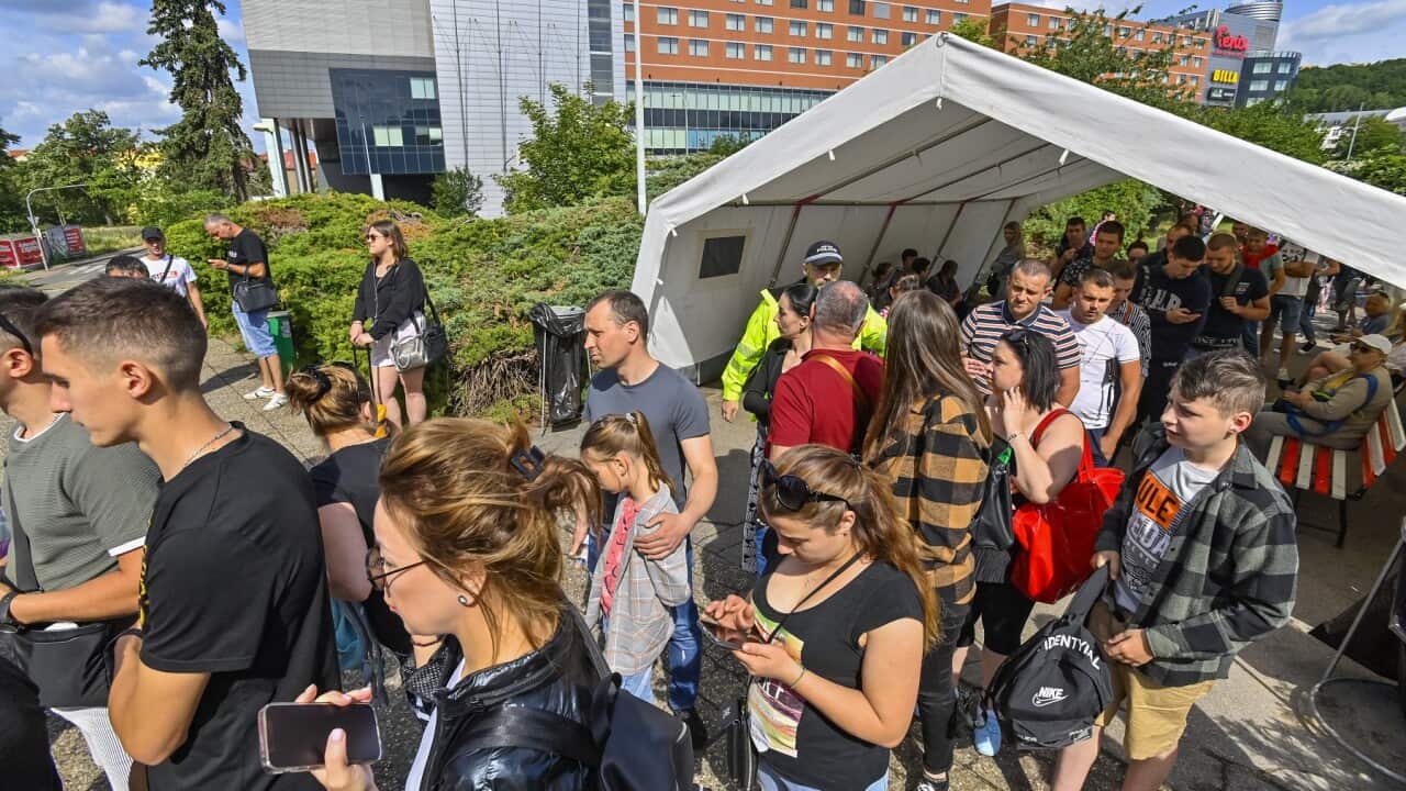 Ukrainian war refugees are seen outside regional assistance centre for Ukrainian refugees in Prague, Czech Republic, on June 14, 2022. Photo/Vit Simanek (CTK via AP Images)