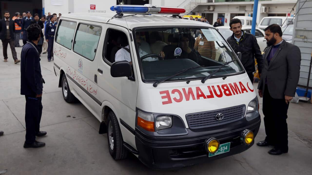 An ambulance in Pakistan carries victims who died from a bomb explosion in a previous Taliban stronghold.