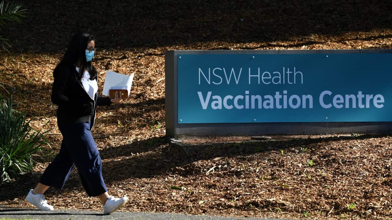 Signage at a mass COVID-19 vaccination hub in Sydney, Monday, May 10, 2021. The hub will be open to people in categories 1a and 1b before expanding to anyone over 50 from May 24.