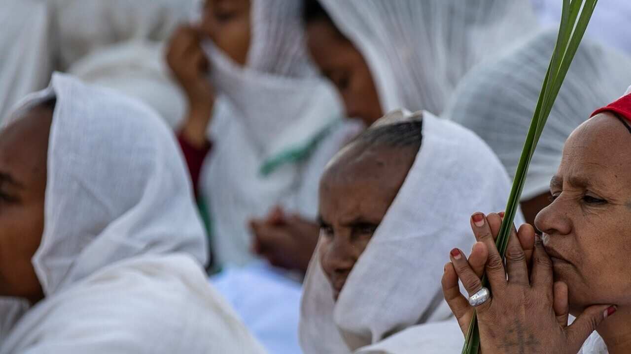 Congregants pray during a Sunday morning service of the Ethiopian Orthodox Tewahedo Church in Mekele, Tigray.