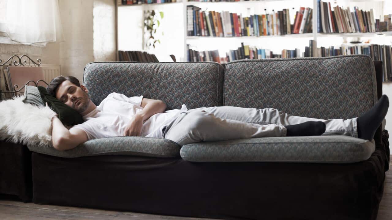 Man sleeping on sofa