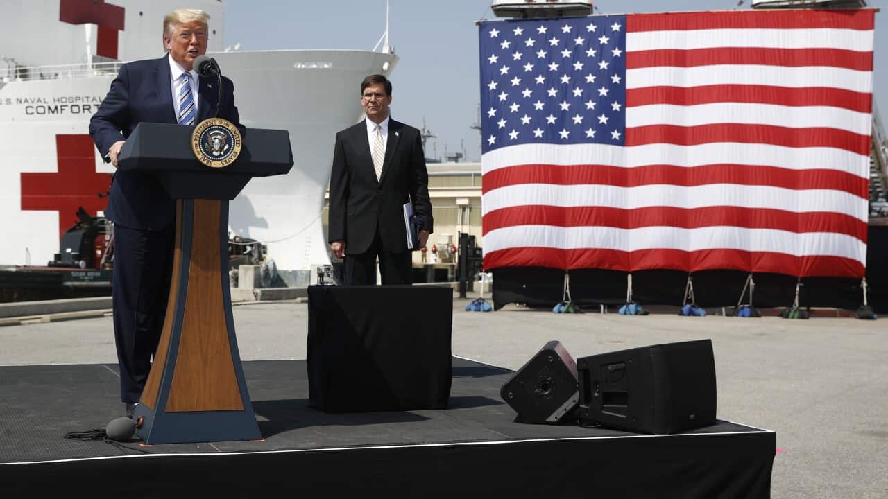 President Donald Trump and former Defense Secretary Mark Esper in front of the US Navy hospital ship USNS Comfort, March 28, 2020.