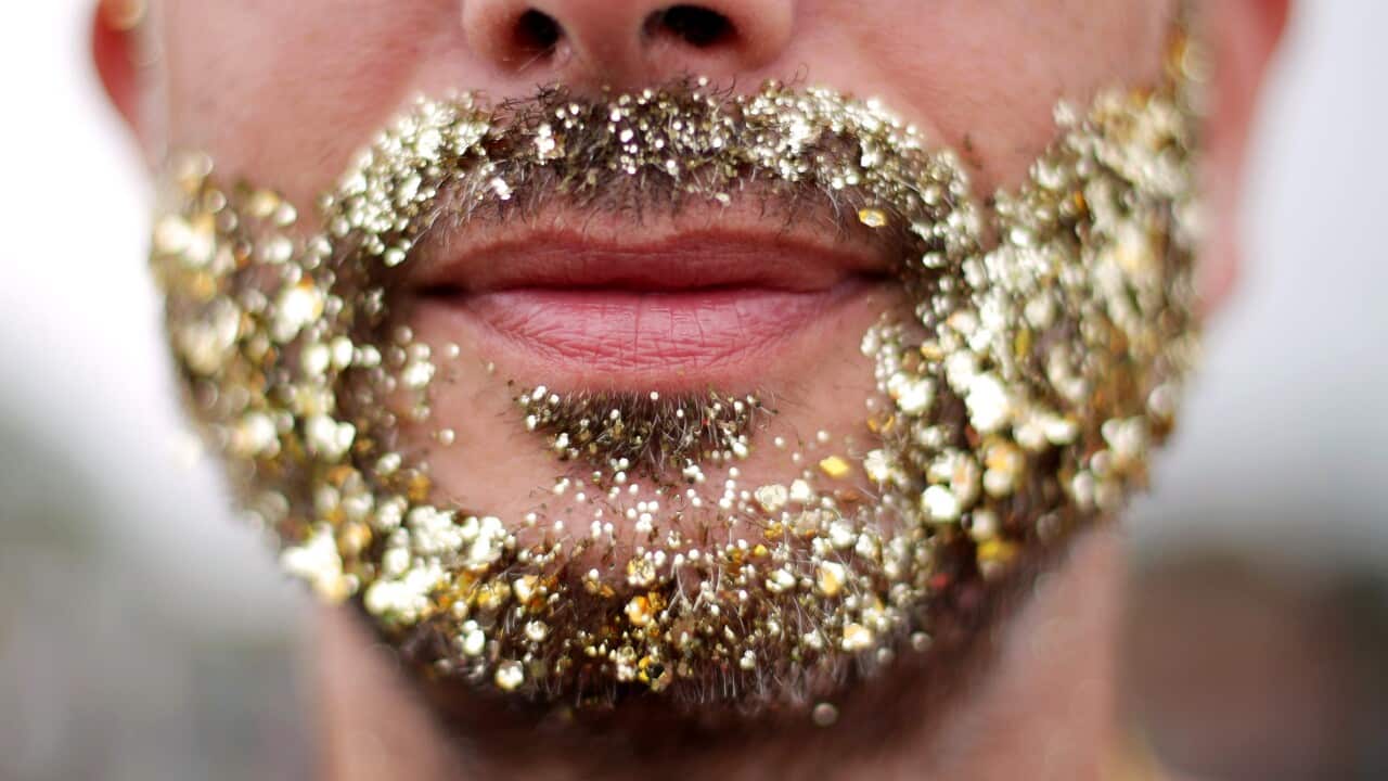 Festivalgoer Will Hagerty with a glitter-decorated beard at Glastonbury Festival, at Worthy Farm in Somerset.. Picture date: Saturday June 24, 2017. See PA story SHOWBIZ Glastonbury. Photo credit should read: Yui Mok/PA Wire