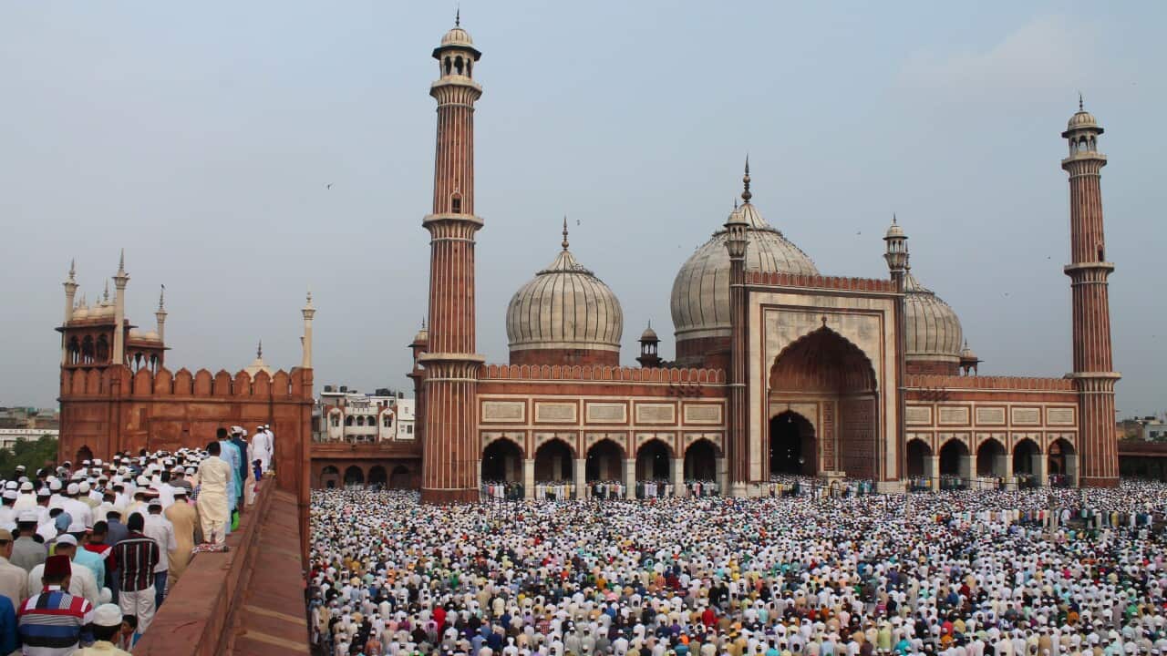 People offer prayers during Eid al-Fitr at the Jama Masjid mosque in New Delhi