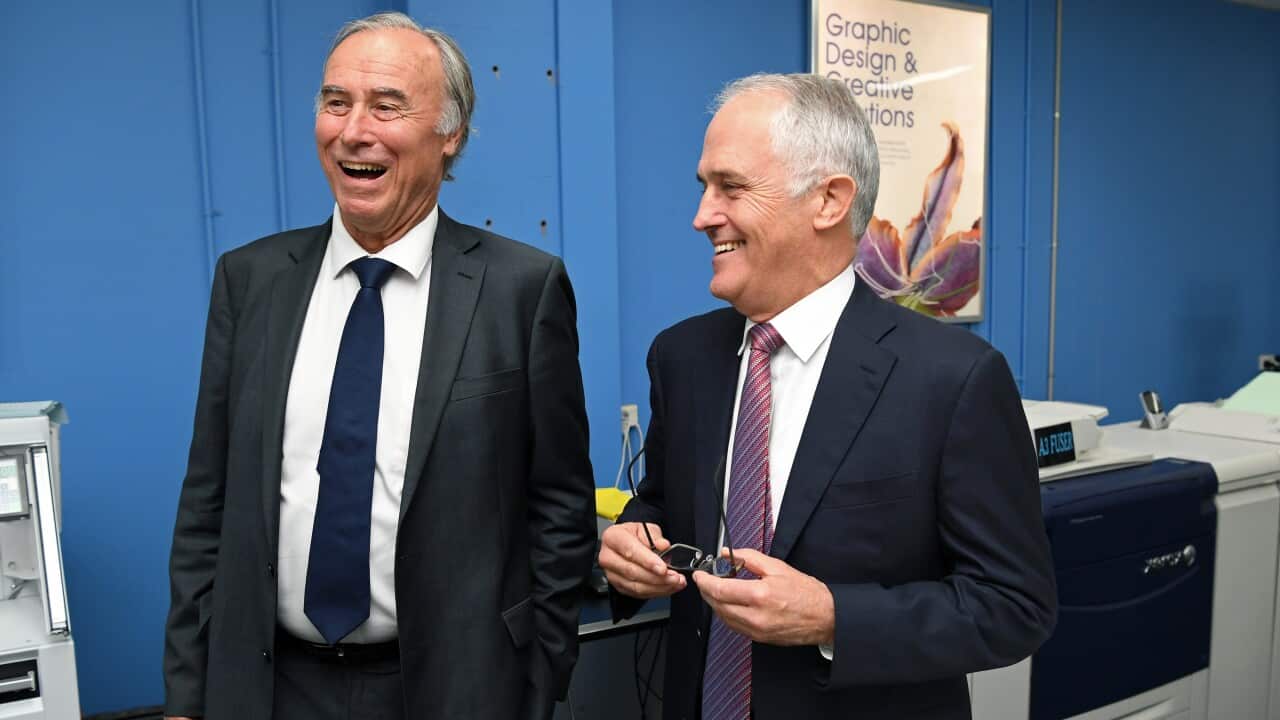 (File Image) Malcolm Turnbull and John Alexander visit a printing company in Sydney in April 2017.