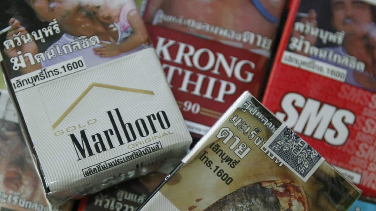 Cigarette packages show graphic pictures of the risks of smoking