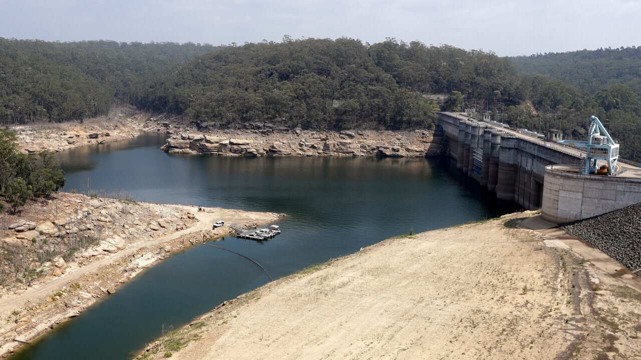 A boom floats across a small bay near the dam wall at Warragamba Dam in Warragamba, Australia, Wednesday, 29 January, 2020.