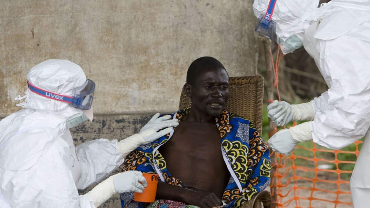 A patient, center, with Ebola hemorrhagic fever, Congo