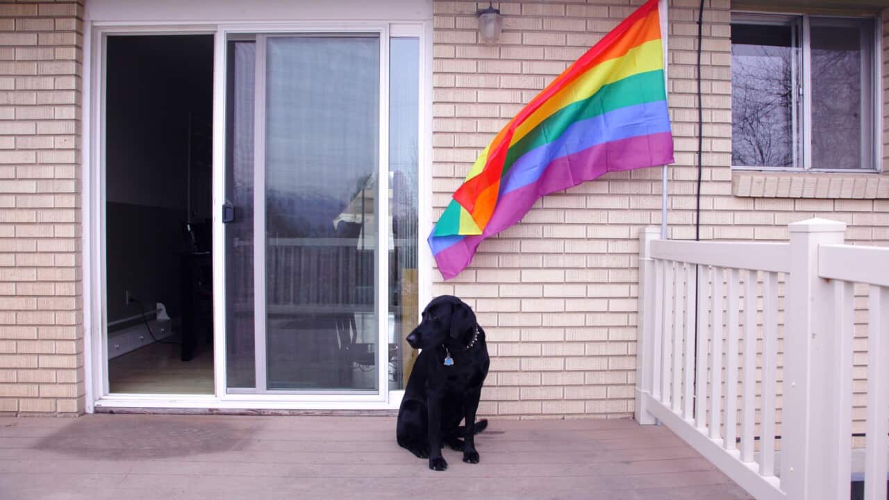 Family home with pride flag