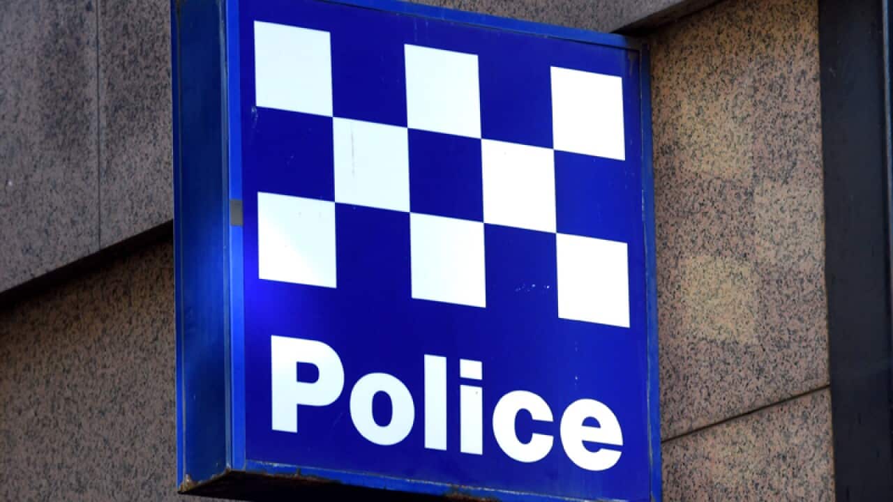 A police station sign