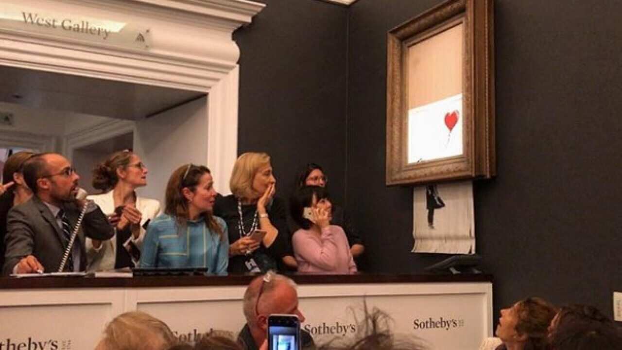 The painting gets shredded shortly after being auctioned.