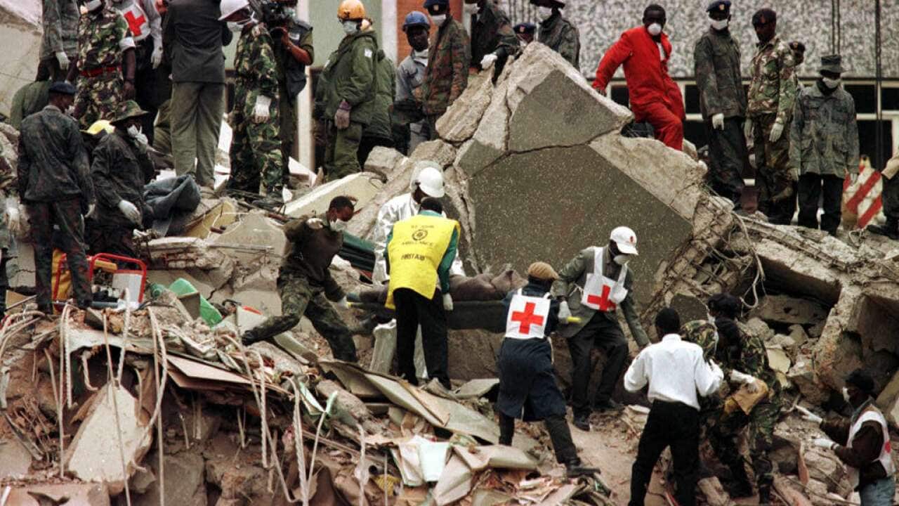Searching through the wreckage of the US embassy in Nairobi in 1998 - Getty Images.jpg