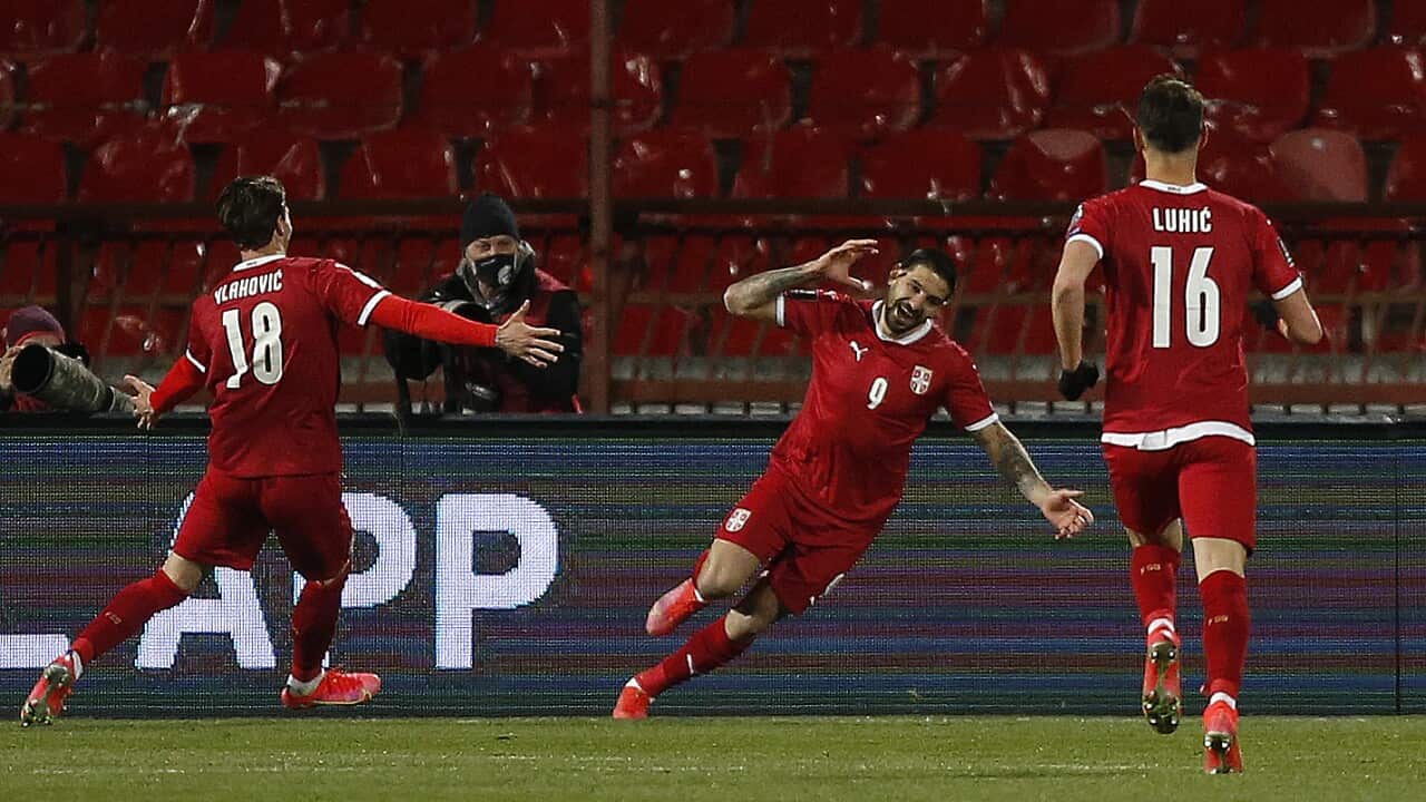 Serbia's Aleksandar Mitrovic celebrates scoring his second goal in the 2022 FIFA World Cup Qualifying match against Ireland.
