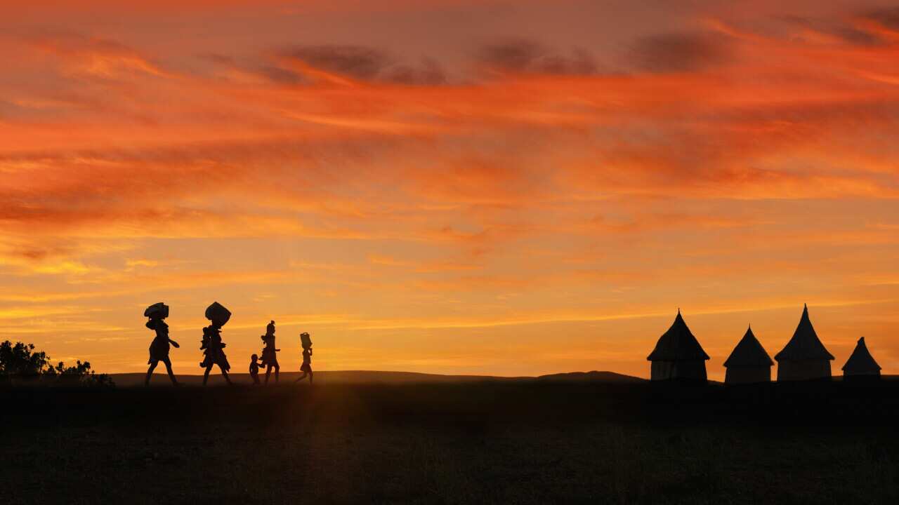 Himba women returning to their village