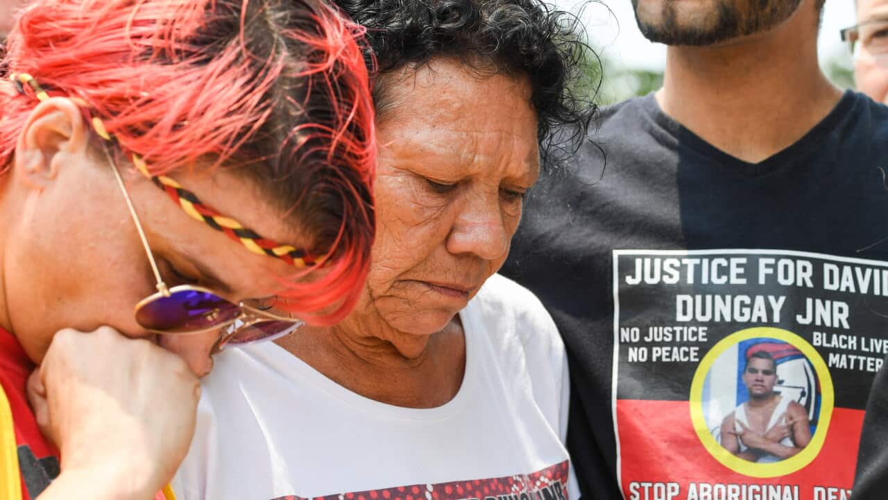 David Dungay's cousin Lizzie Jarrett and his mother Leetona Dungay and nephew Paul Silva outside the Lidcombe Coroner's Court in Sydney.