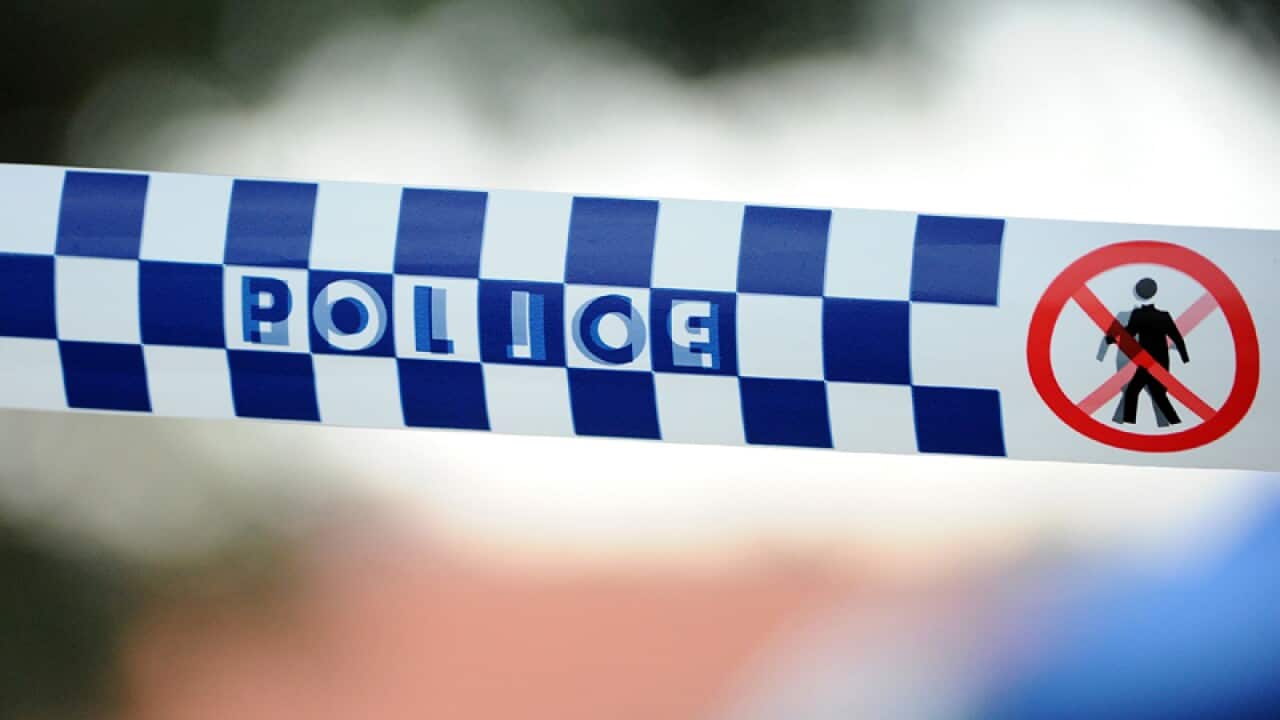 Police tape outside a home