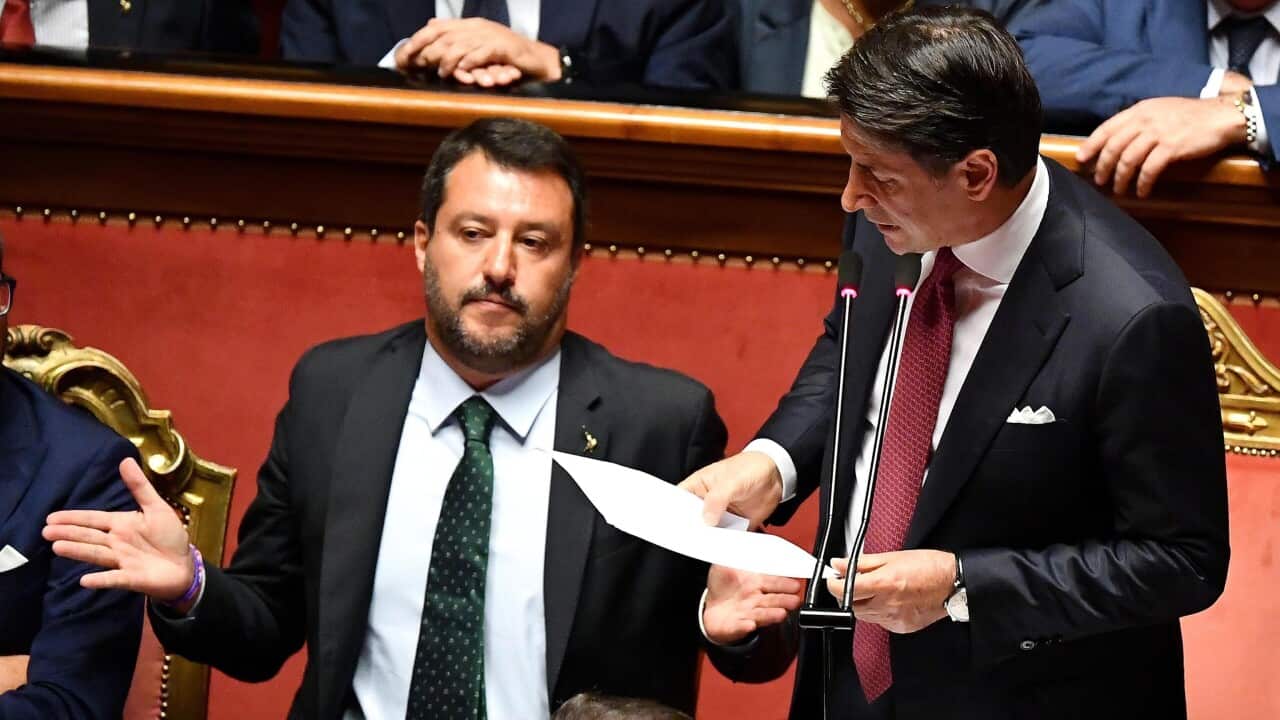 Italian Premier Giuseppe Conte (R) is flanked by Deputy Premier and Interior Minister Matteo Salvini (L).
