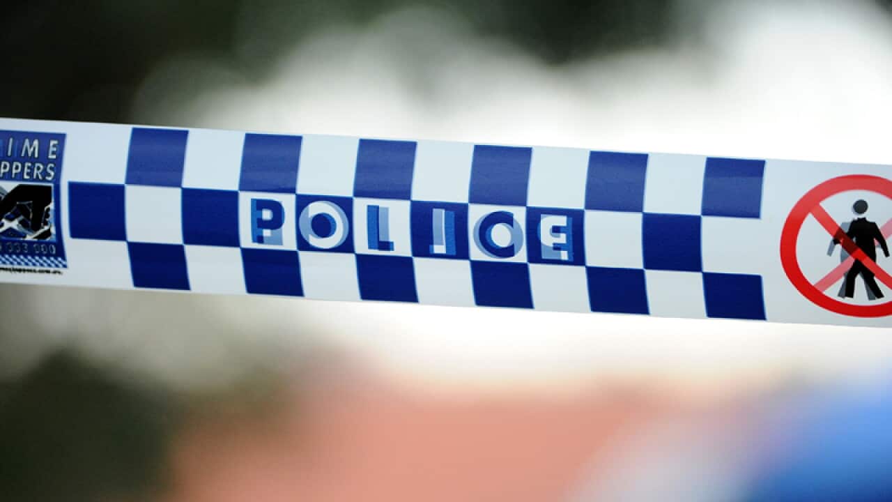 Police tape outside a home