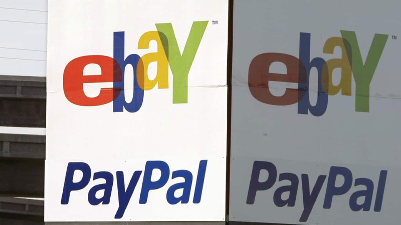 An eBay/PayPal sign.