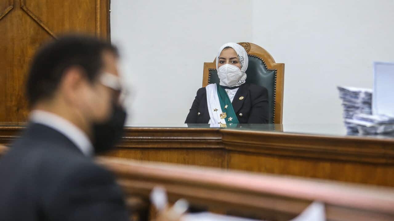 Egyptian female judge Radwa Helmi Ahmad sits on her first court hearing at the State Council in the capital Cairo