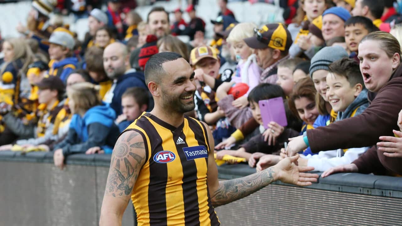 Shaun Burgoyne of the Hawks is seen with fans after winning the Round 20 AFL match between the Hawthorn Hawks and the Essendon Bombers at the MCG in Melbourne, Saturday, August 4, 2018. (AAP Image/David Crosling) NO ARCHIVING, EDITORIAL USE ONLY