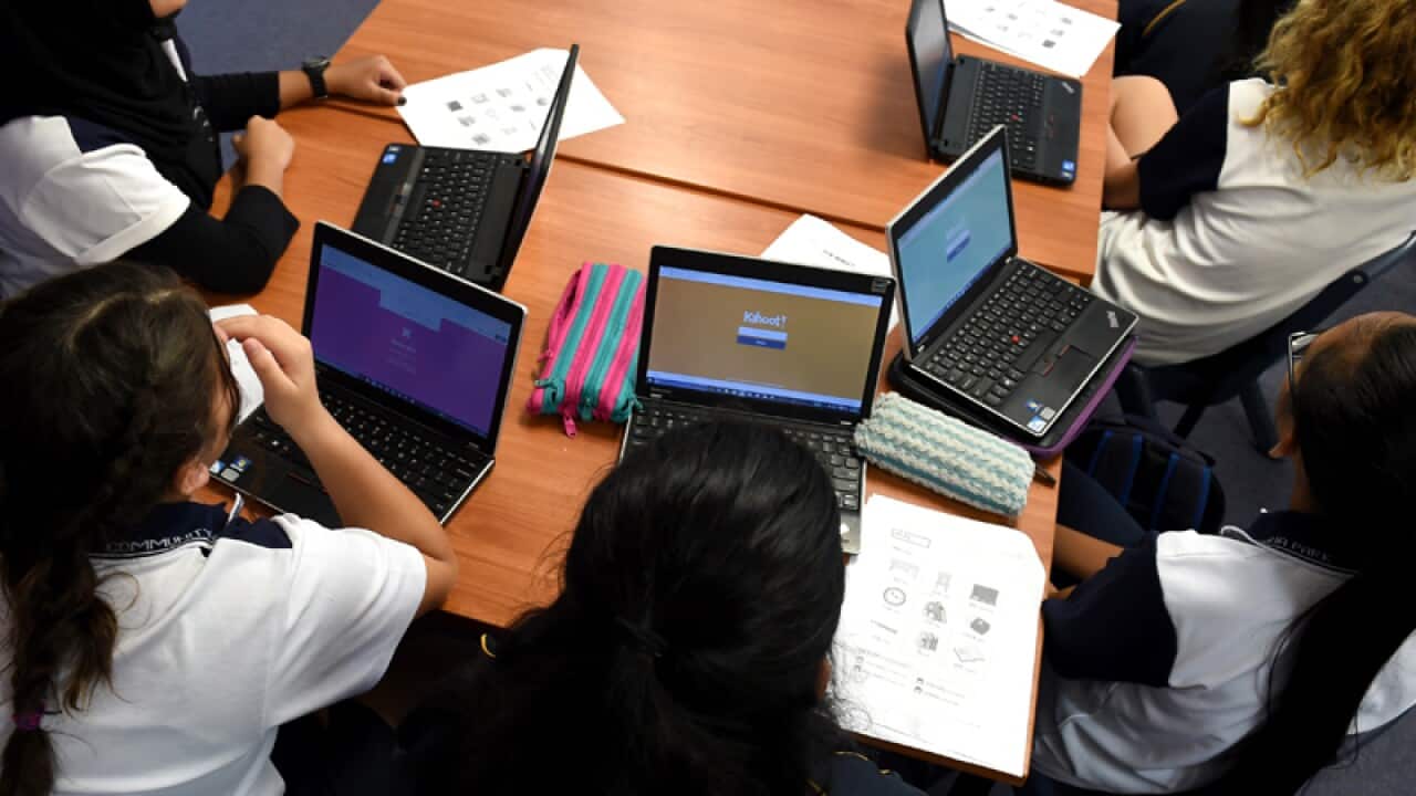 School students attend class