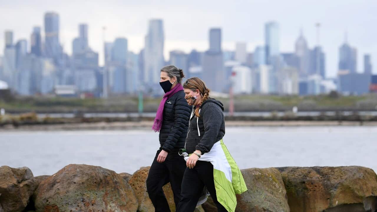People wearing face masks are seen in Melbourne