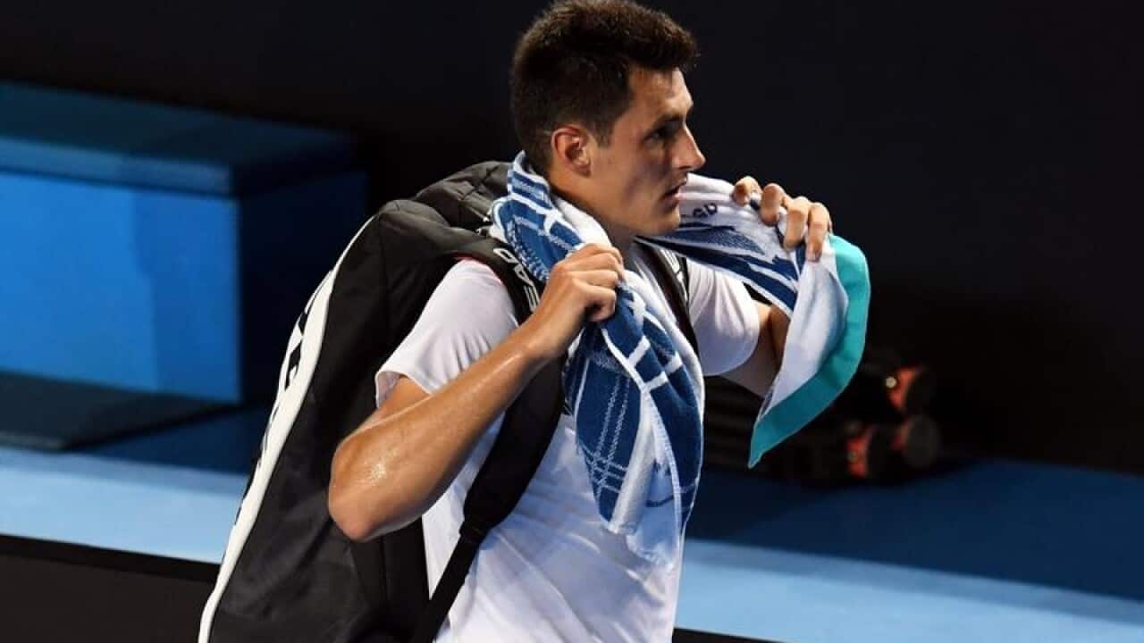 Bernard Tomic of Australia leaves Hisense Arena