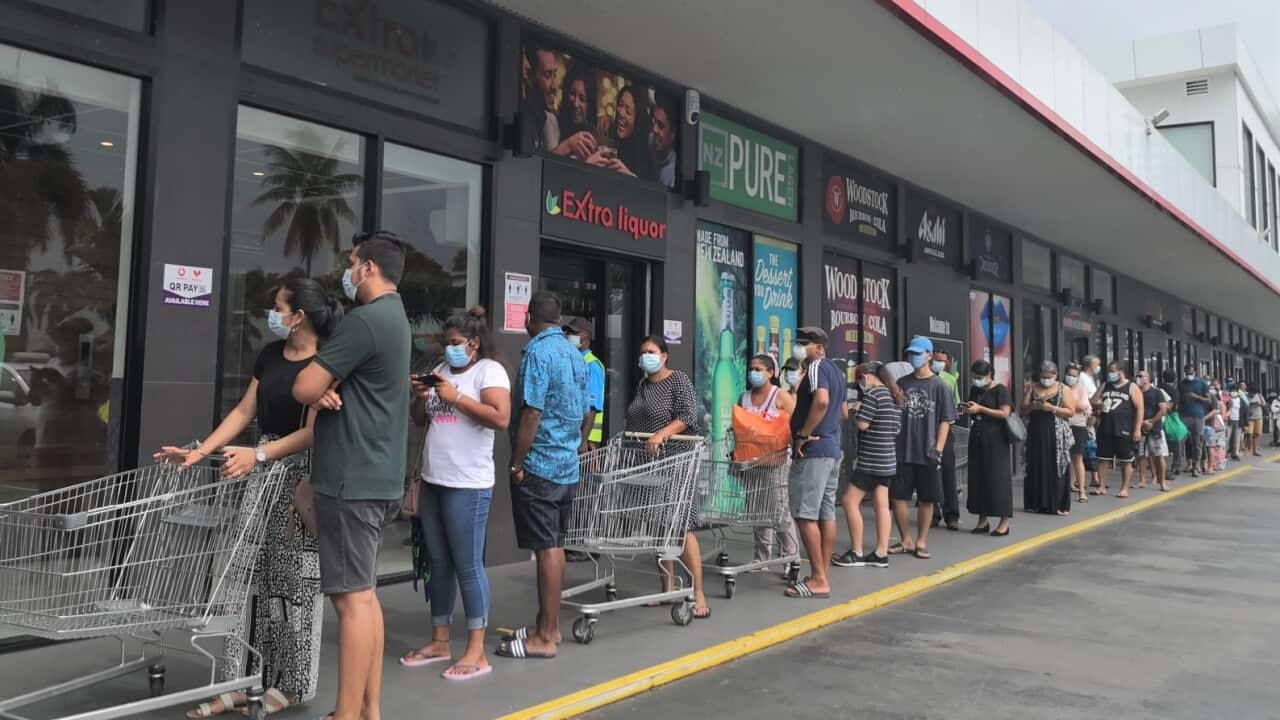 People line up for shopping outside a supermarket ahead in Suva, Fiji. (file)