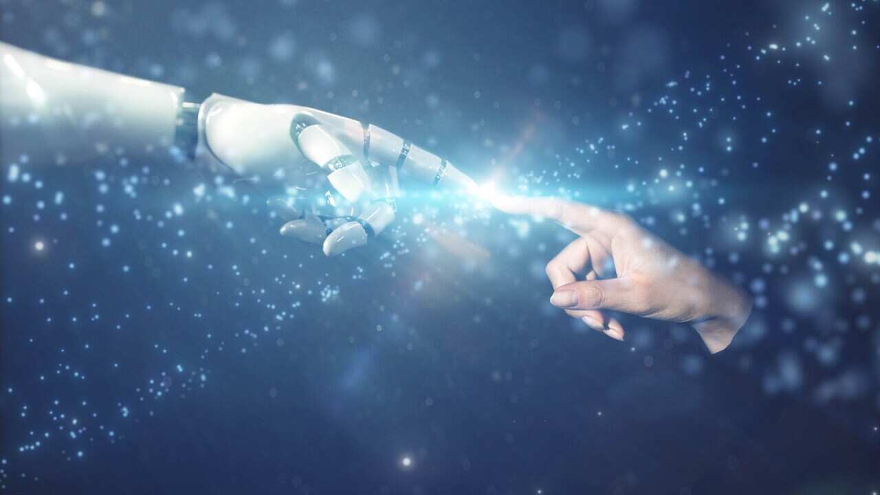 robot hand touches human hand