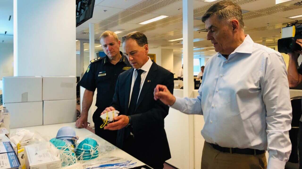 Health Minister Greg Hunt and Chief Medical Officer Brendan Murphy visit the National Incident Centre in Canberra.  