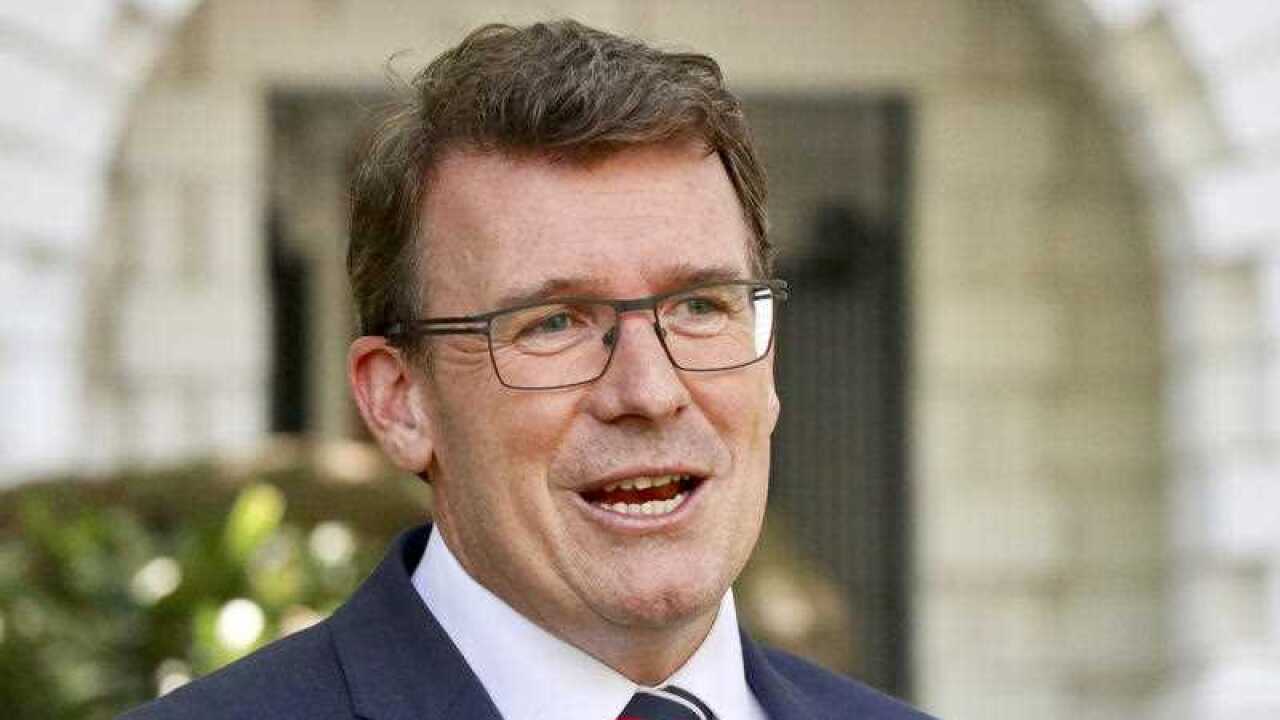 Minister for Human Services Alan Tudge speaks to the media during a press conference in Melbourne, Thursday, January 25, 2018.