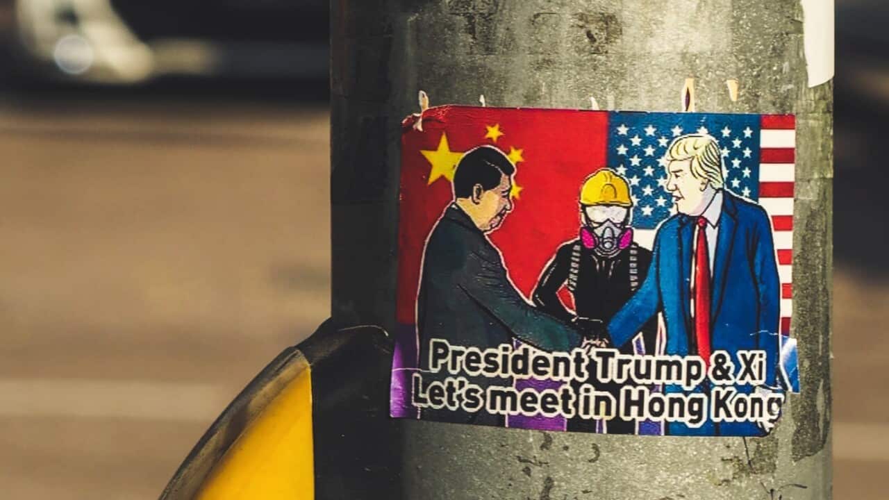 A sticker of Mr Xi and Mr Trump shaking hands