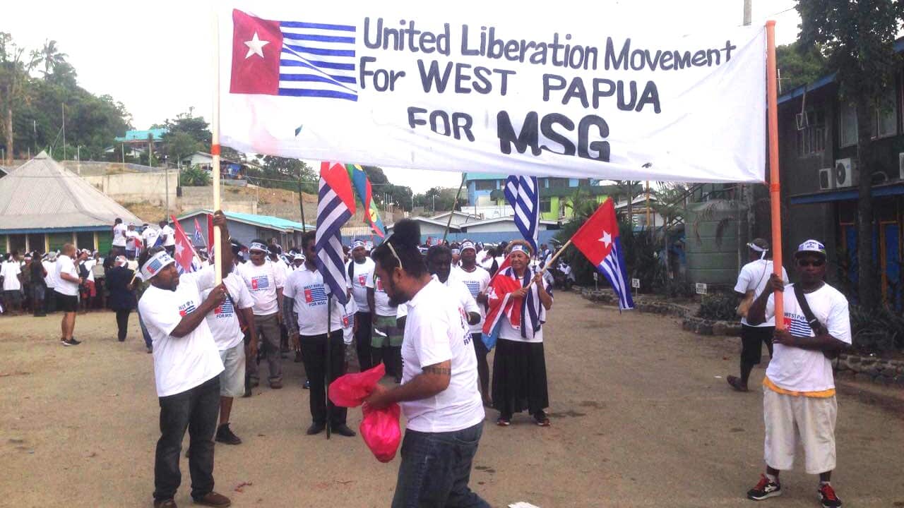 Solomon Islanders march in support of West Papua at the Melanesian Spearhead Group meeting in Honiara.