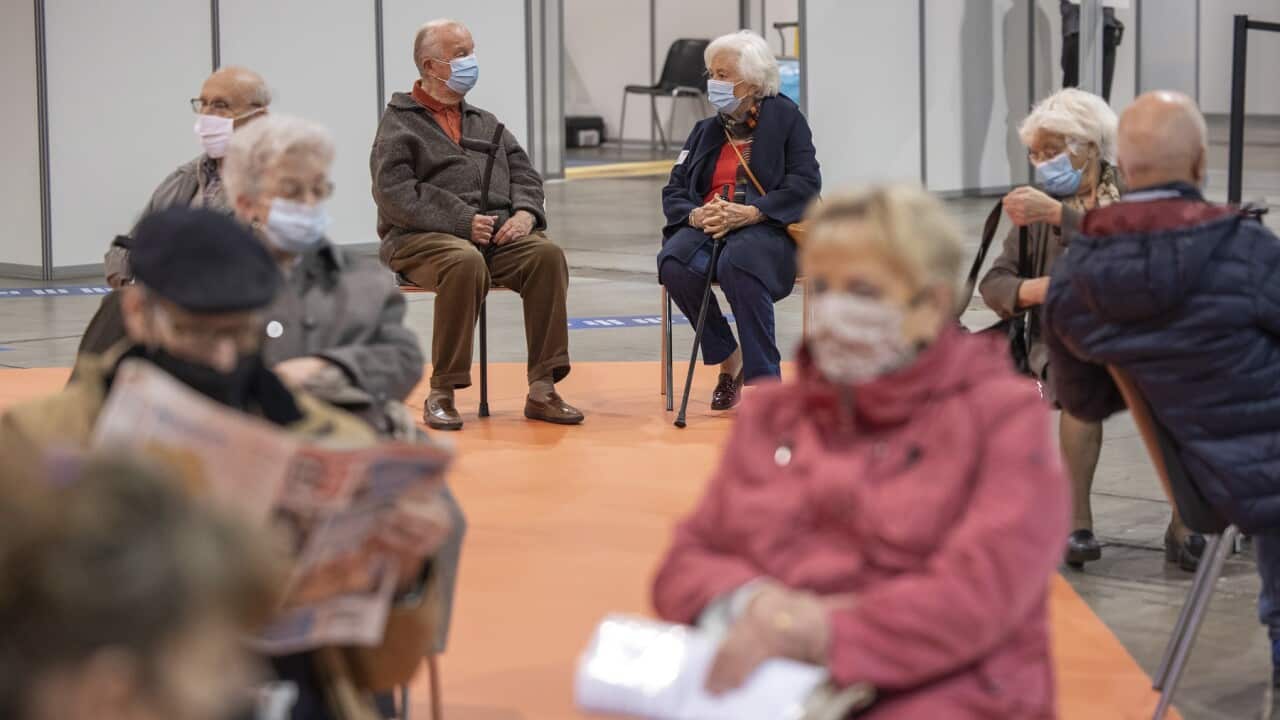 Belgium's King Albert II and Queen Paola (at rear) are among the seniors getting vaccinated in Brussels
