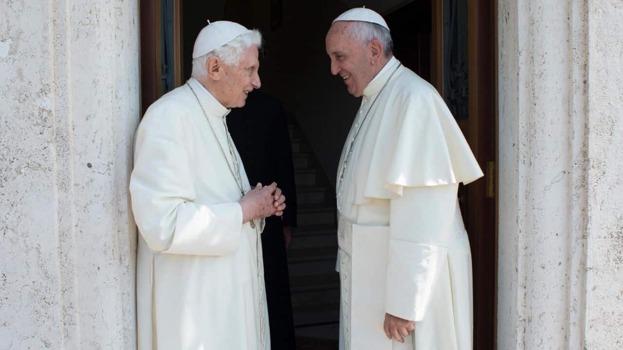 Pope Francis (R) meeting Pope Emeritus Benedict XVI at Vatican City in 2015 (AAP).