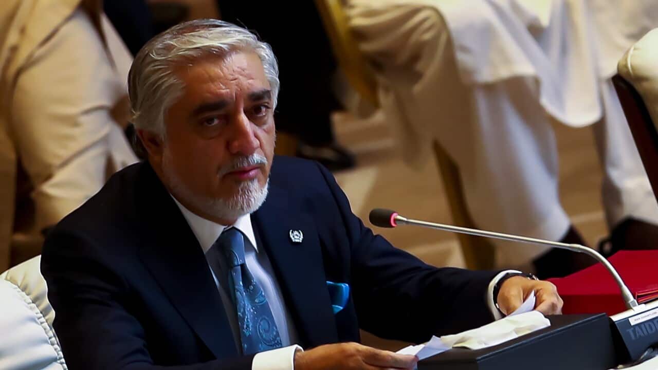 Afghanistan Peace Grand Council chief, Abdullah Abdullah speaks during the opening session of the peace talks between the Afghan government and the Taliban