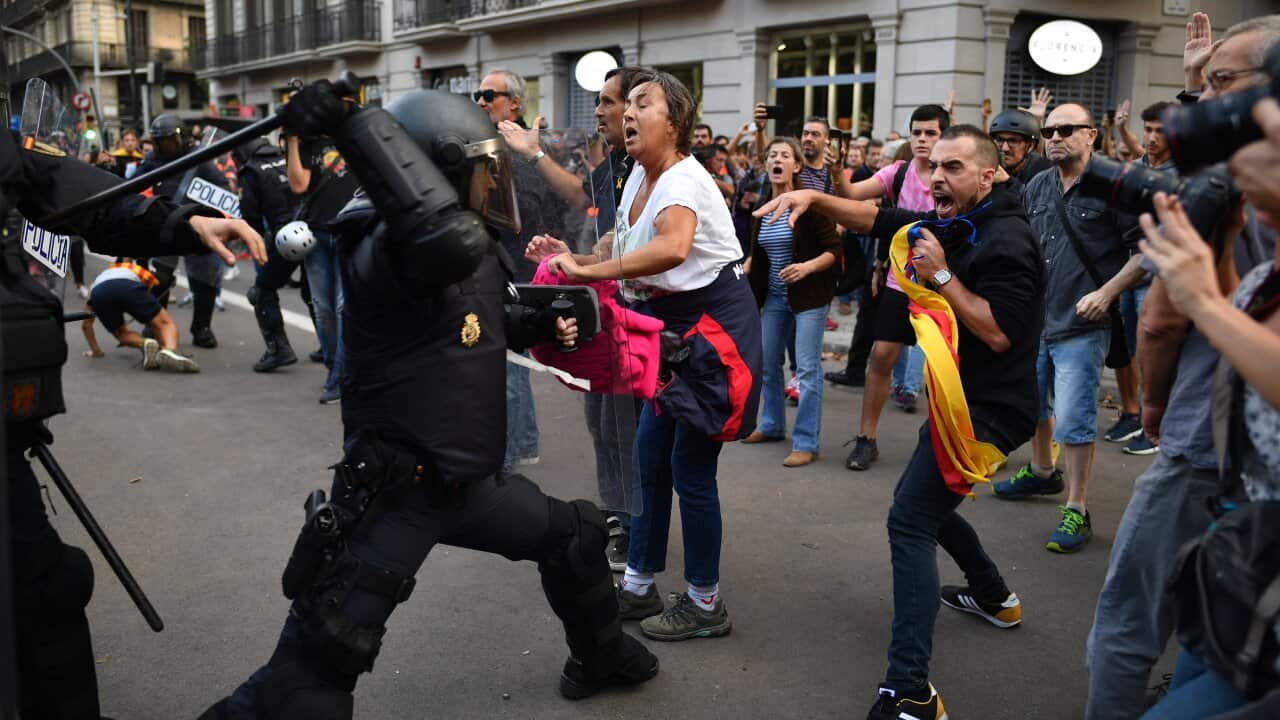 Police clash with protestors in the streets following a week of protests over the jail sentences given to separatist politicians by Spain's Supreme Court.