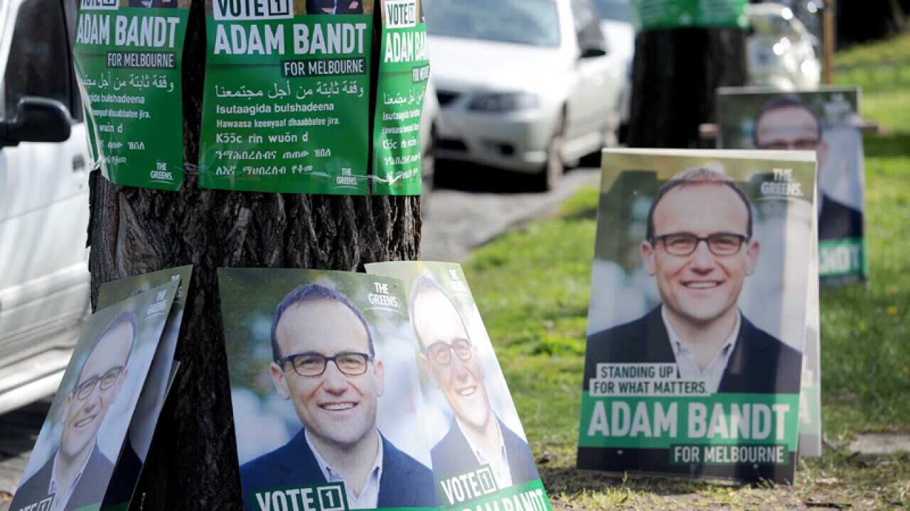 Posters of Greens Deputy Leader Adam Bandt in Melbourne