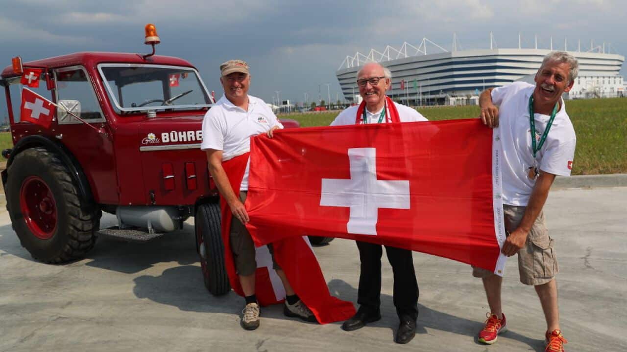 Swiss football fans travel to Kaliningrad for 2018 FIFA World Cup match between Switzerland and Serbia by tractor