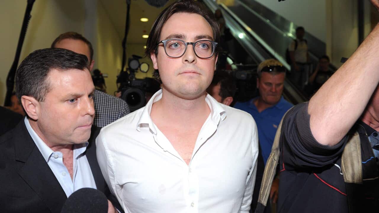 Nick Kelly, a member of the Budgie Nine arrives at Sydney International Airport in Sydney, Friday, Oct. 7, 2016.