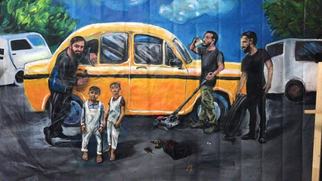 Painting of Yasin Madni Warraich and friends.jpeg