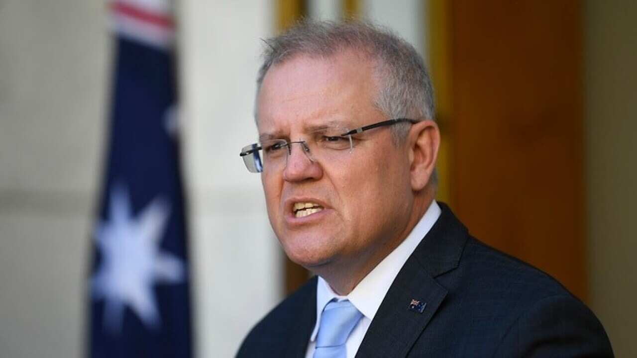 Australian Prime Minister Scott Morrison speaks to the media.