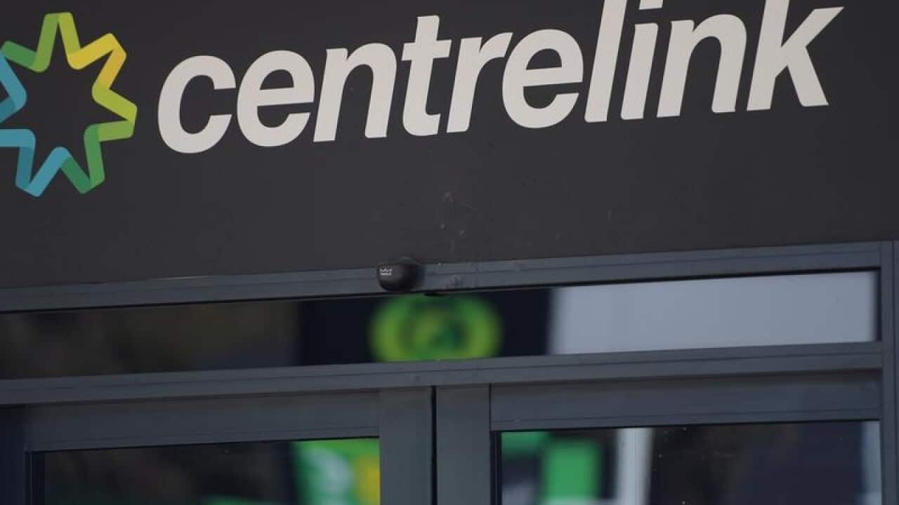 Centrelink sign and logo on an office