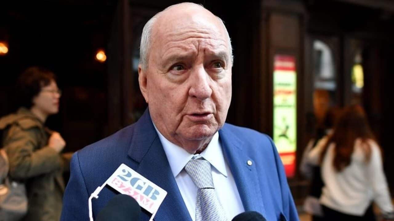 Alan Jones speaks to the media.