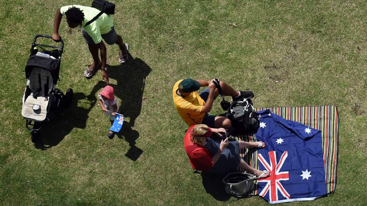 Spectators line the harbour foreshore to watch Australia Day celebrations in Sydney on Tuesday, Jan. 26, 2016. (AAP Image/Paul Miller) NO ARCHIVING