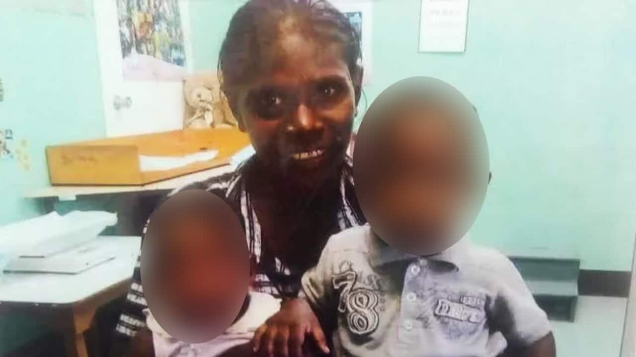 Allison Neridine Bernard pictured with her two children