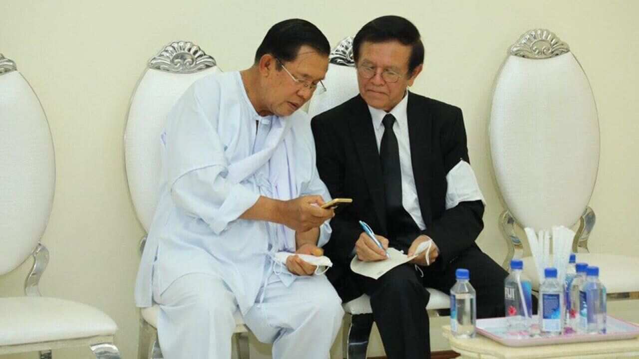 PM Hun Sen and Kem Sokha meet at the funeral of PM's mother in law